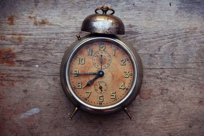 Close-up of clock on wall