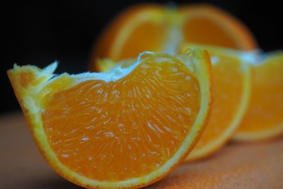 Close-up of orange slice on table