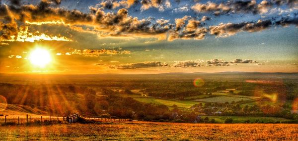 Scenic view of landscape at sunset