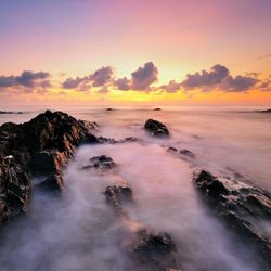 Scenic view of sea at sunset