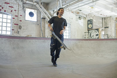 Young man skateboarding.