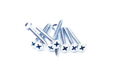 High angle view of chain against white background