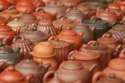 High angle view of teapots displayed for sale