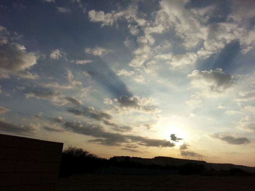 sunset, sky, silhouette, cloud - sky, scenics, tranquil scene, beauty in nature, tranquility, cloud, built structure, building exterior, cloudy, nature, architecture, landscape, idyllic, mountain, orange color, outdoors, dusk