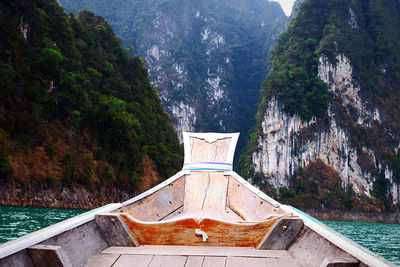Scenic view of river amidst mountains