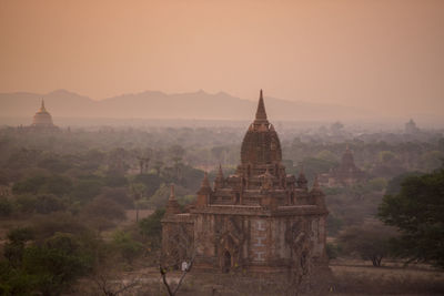 Old ruins of temples against clear sky