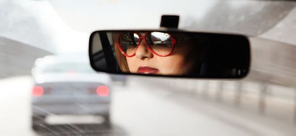 Reflection of woman in mirror