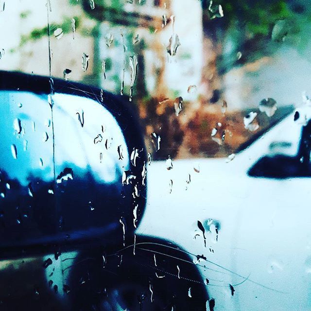 transportation, mode of transport, land vehicle, car, vehicle interior, glass - material, transparent, windshield, window, drop, wet, car interior, rain, side-view mirror, water, travel, indoors, raindrop, reflection, season