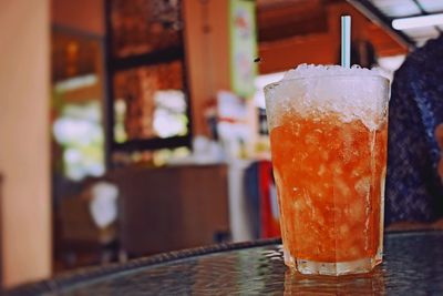 Close-up of beer in glass on table