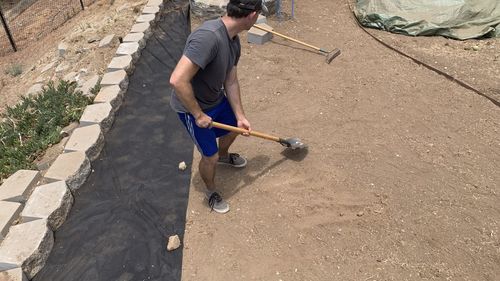 High angle view of man holding umbrella