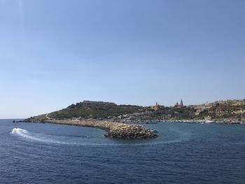 Scenic view of sea against clear sky