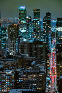 Illuminated buildings in city at night