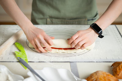 Midsection of man preparing food