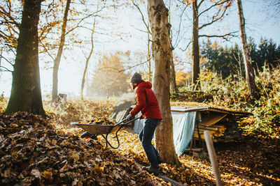 Man doing some autumn cleaning in his garden