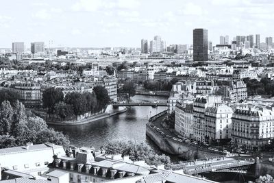 High angle view of river amidst buildings in city