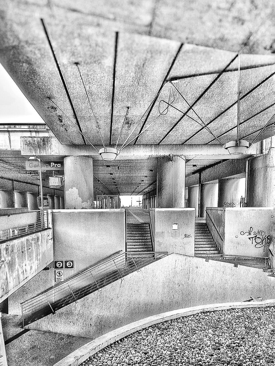 built structure, railing, architecture, steps, steps and staircases, sunlight, indoors, ceiling, empty, high angle view, day, metal, staircase, shadow, the way forward, incidental people, transportation, pattern, no people, absence