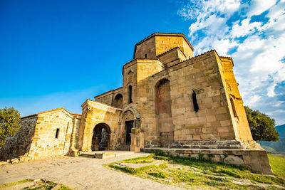 Low angle view of old building against sky