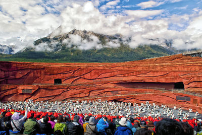 Group of people looking at mountain