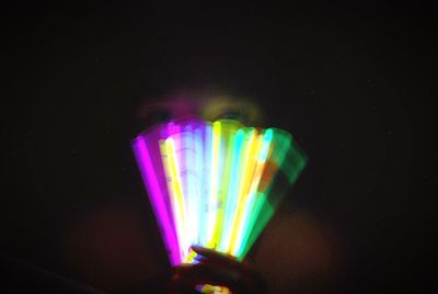 Close-up of colorful lights over black background