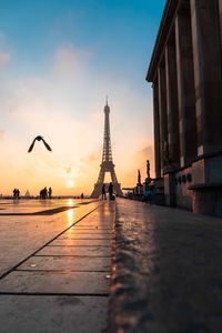 View of city street during sunset