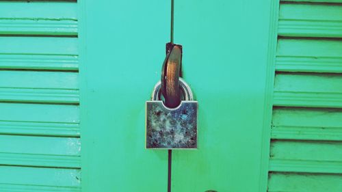 Close-up of padlock on door