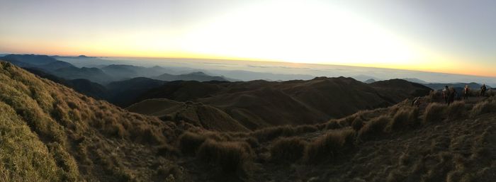 Scenic view of mountains against sky during sunset