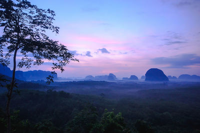 Scenic view of landscape against sky during sunset