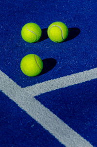 High angle view of yellow balls on floor