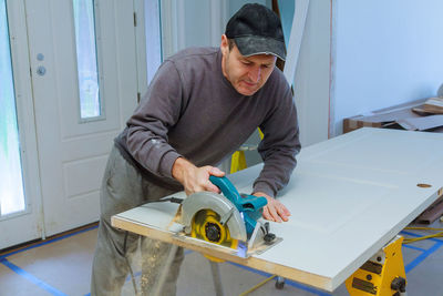 Carpenter working at home