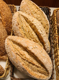 High angle view of bread in baskets on table in store