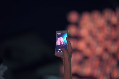 Close-up of hand holding smart phone