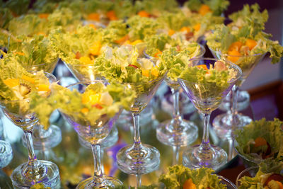 High angle view of salad in glasses on table