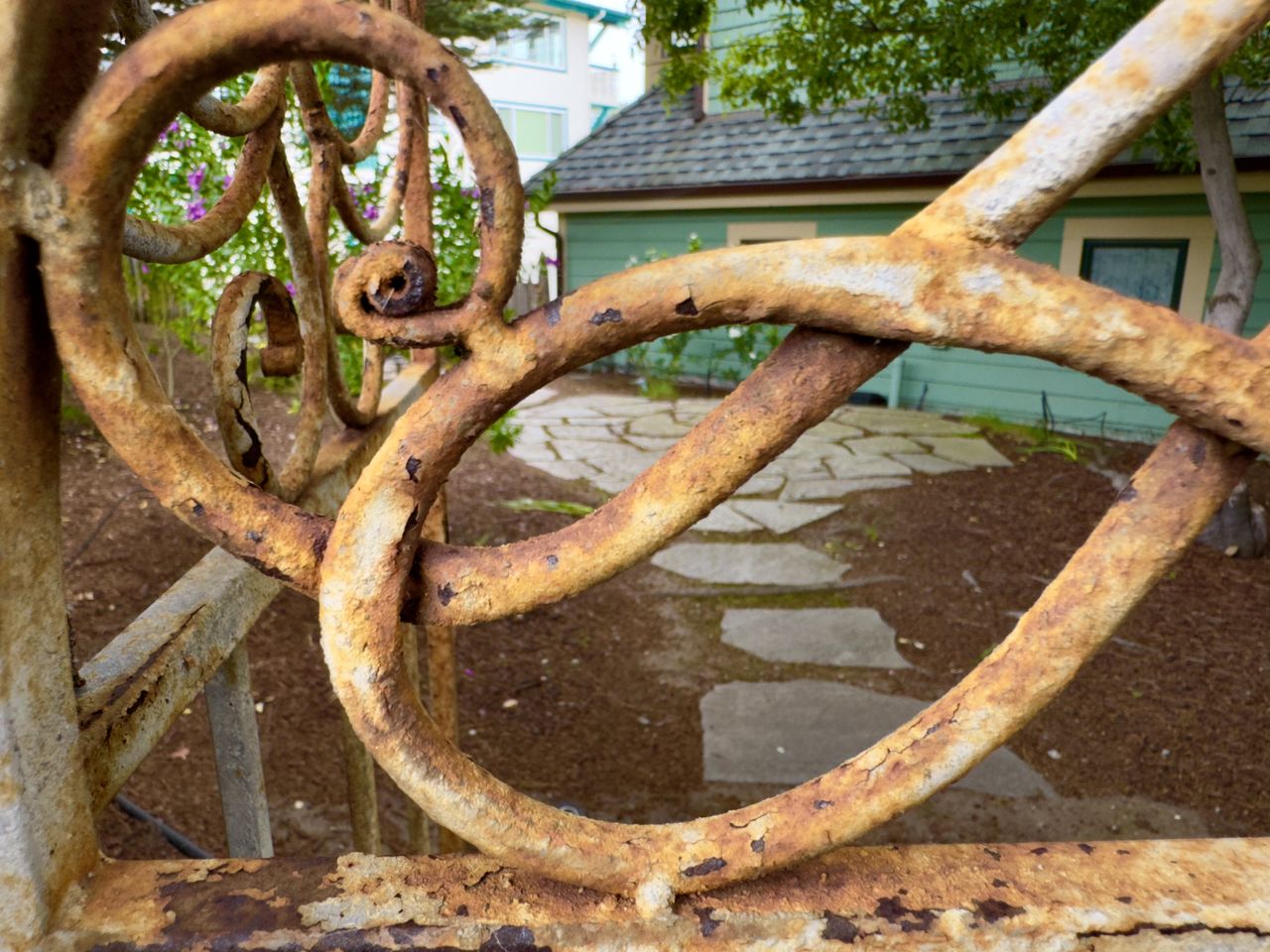 metal, rusty, day, wood, no people, nature, iron, wheel, outdoors, tree, plant, transportation, architecture, old, sunlight, abandoned, vehicle, water, sculpture, weathered, circle, playground, geometric shape