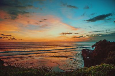 Scenic view of sea against sky during sunset