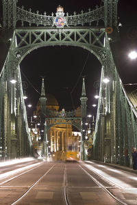 View of illuminated bridge at night