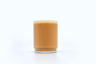 Close-up of drink against white background