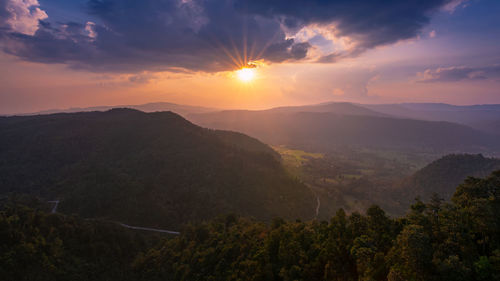 Scenic view of mountains against sky during sunset