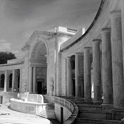 Architectural columns in the courtyard of the background