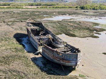 Abandoned boat  run aground and wrecked 