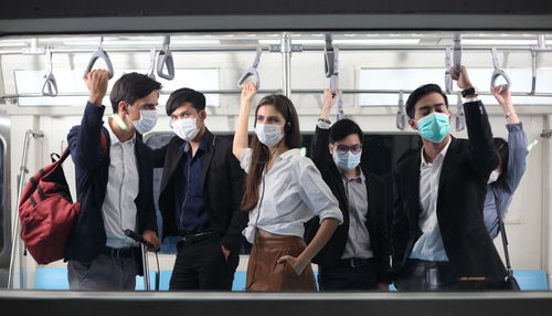 Group of people standing in corridor