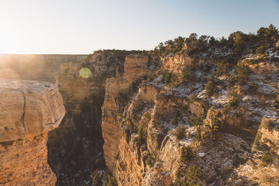 Scenic view of cliff against clear sky