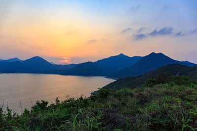 Scenic view of sea against sky during sunset