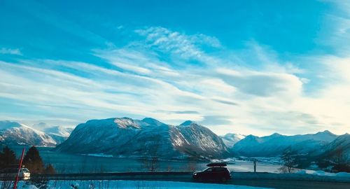 Scenic view of snowcapped mountains against sky