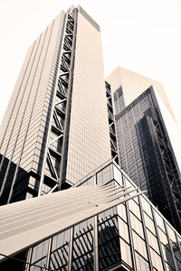 Low angle view of modern buildings against clear sky