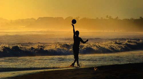 Scenic view of sea at sunset