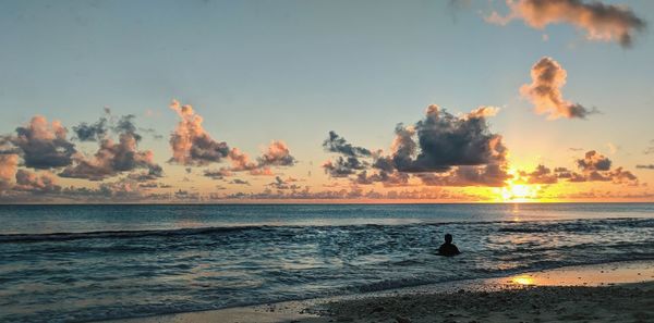 Panoramic view of sea against sky during sunset