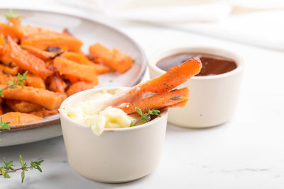 Close-up of food in plate on table
