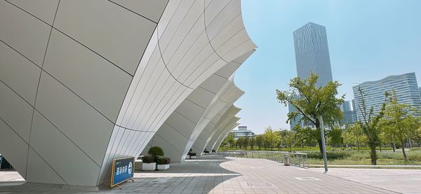 Low angle view of modern buildings against sky