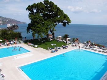 Panoramic view of swimming pool against sky