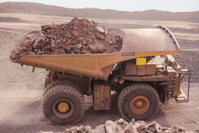 Mining activity, mining dump truck, high angle view of truck working on field